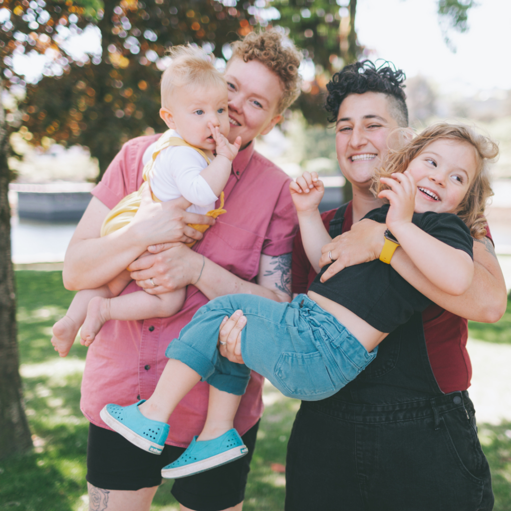 photo of a LGBTQIA family with two kids