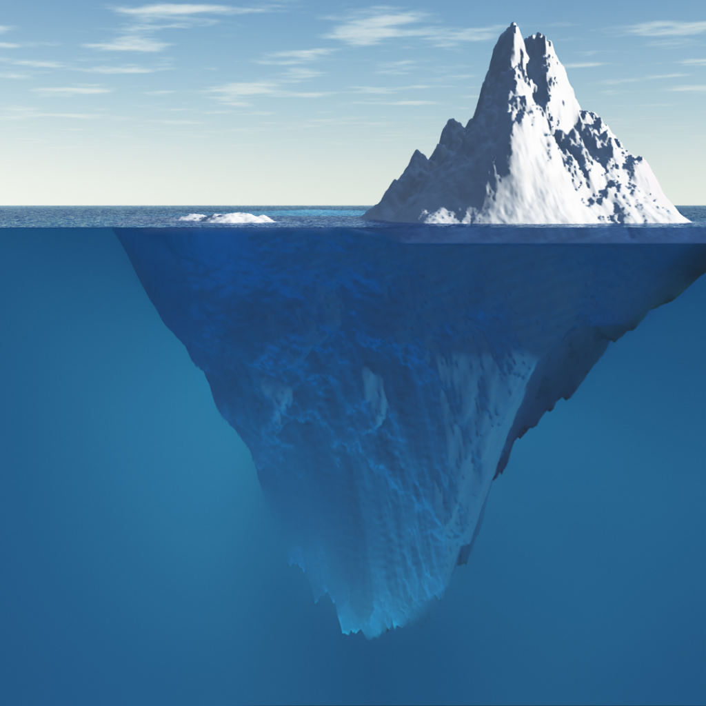 Photo of an iceberg - we can see both the top and the bottom of the iceberg